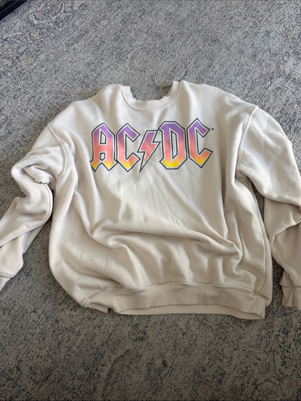 AC/DC Cream Sweatshirt with Purple-to-Yellow Gradient Logo